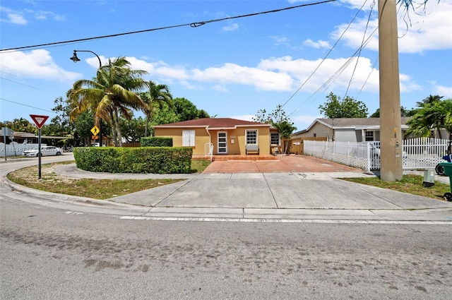 590 SW 62nd Ave, Miami, FL 33144 - view of front of property featuring driveway and stucco siding
