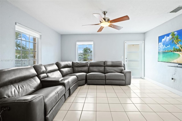 590 SW 62nd Ave, Miami, FL 33144 - living area with a ceiling fan and light tile patterned floors