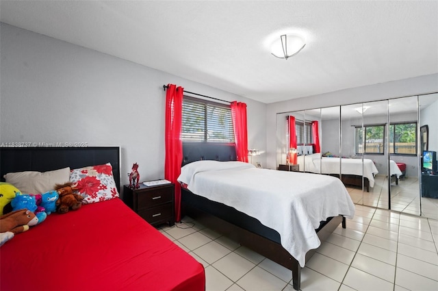 590 SW 62nd Ave, Miami, FL 33144 - bedroom with light tile patterned flooring and multiple windows