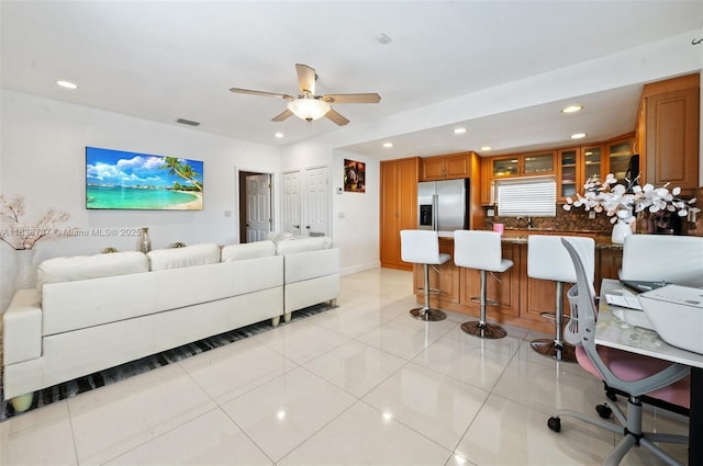 590 SW 62nd Ave, Miami, FL 33144 - living area featuring recessed lighting, ceiling fan, light tile patterned flooring, and bar area
