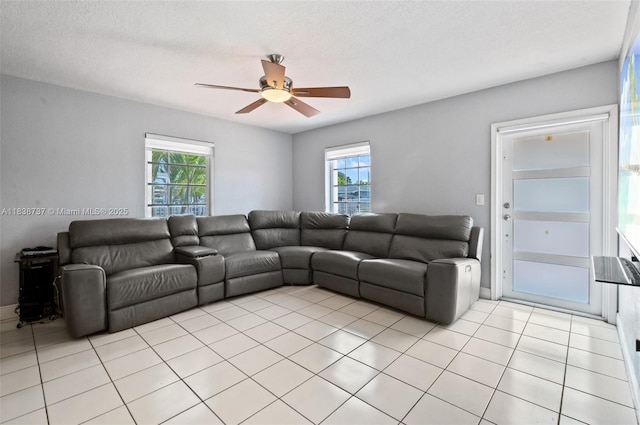 590 SW 62nd Ave, Miami, FL 33144 - living area with a ceiling fan, plenty of natural light, and light tile patterned floors