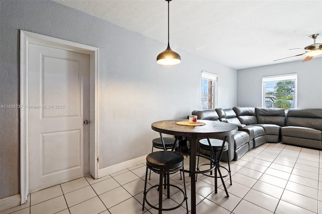 590 SW 62nd Ave, Miami, FL 33144 - dining area with light tile patterned flooring and ceiling fan