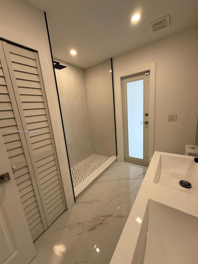 1655 NW 111th Way, Coral Springs, FL 33071 - full bath featuring marble finish floors, a tile shower, recessed lighting, and double vanity