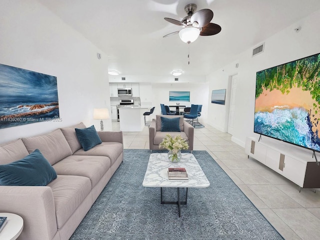 2620 S University Dr Unit 111, Davie, FL 33328 - living room with light tile patterned flooring and ceiling fan