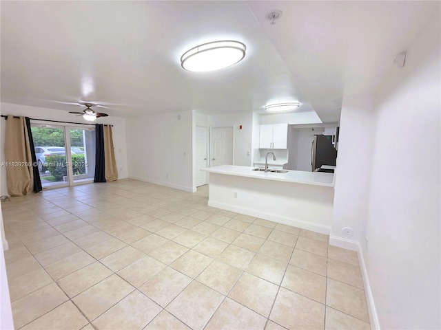 2620 S University Dr Unit 111, Davie, FL 33328 - unfurnished living room with light tile patterned floors and ceiling fan