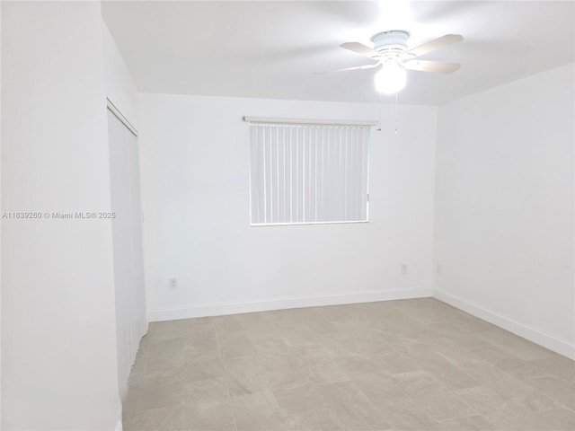 2620 S University Dr Unit 111, Davie, FL 33328 - unfurnished room featuring ceiling fan and baseboards