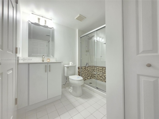 2620 S University Dr Unit 111, Davie, FL 33328 - bathroom featuring a shower stall, vanity, and tile patterned flooring
