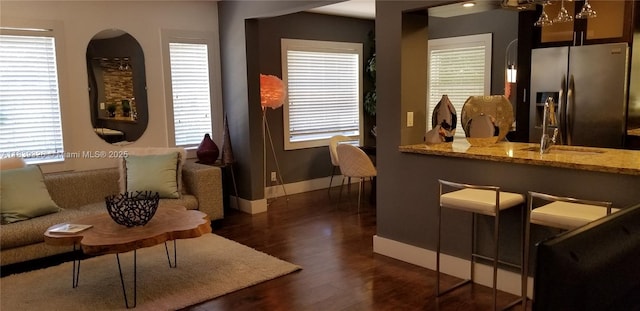 1337 Euclid Ave Unit 101, Miami Beach, FL 33139 - living area featuring dark wood-type flooring and arched walkways