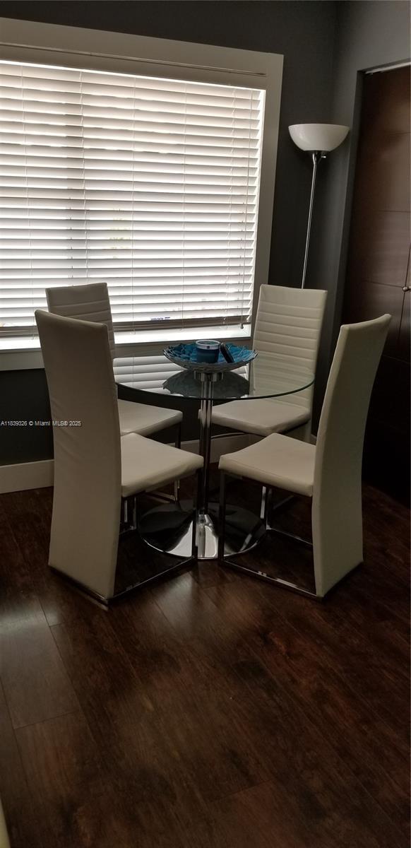 1337 Euclid Ave Unit 101, Miami Beach, FL 33139 - dining room featuring wood finished floors