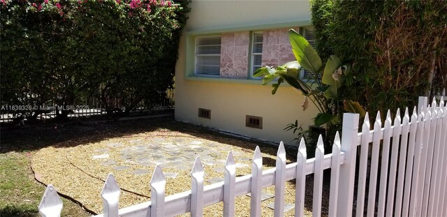 1337 Euclid Ave Unit 101, Miami Beach, FL 33139 - view of side of property with stucco siding and crawl space
