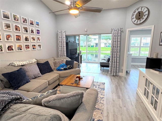 5928 NW 93rd Ter, Tamarac, FL 33321 - living area with a ceiling fan, light wood-style flooring, and high vaulted ceiling