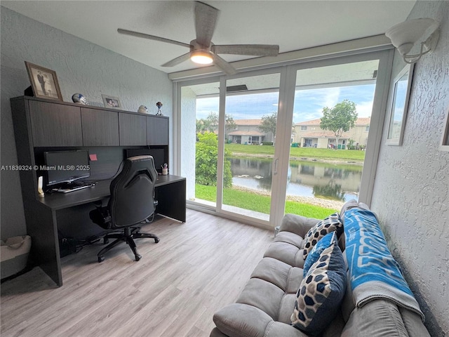5928 NW 93rd Ter, Tamarac, FL 33321 - office area featuring a textured wall, light wood-style flooring, ceiling fan, and lofted ceiling