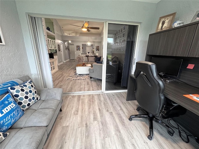 5928 NW 93rd Ter, Tamarac, FL 33321 - office featuring a textured wall, light wood finished floors, and ceiling fan