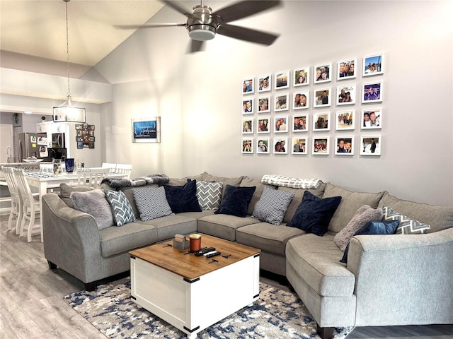 5928 NW 93rd Ter, Tamarac, FL 33321 - living room with ceiling fan, light wood finished floors, and vaulted ceiling
