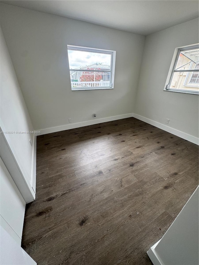 8521 NW 57th Ct, Tamarac, FL 33321 - unfurnished room featuring wood finished floors and baseboards