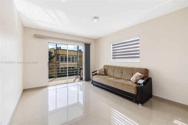 471 Capri J Unit 471, Delray Beach, FL 33484 - tiled living room featuring baseboards