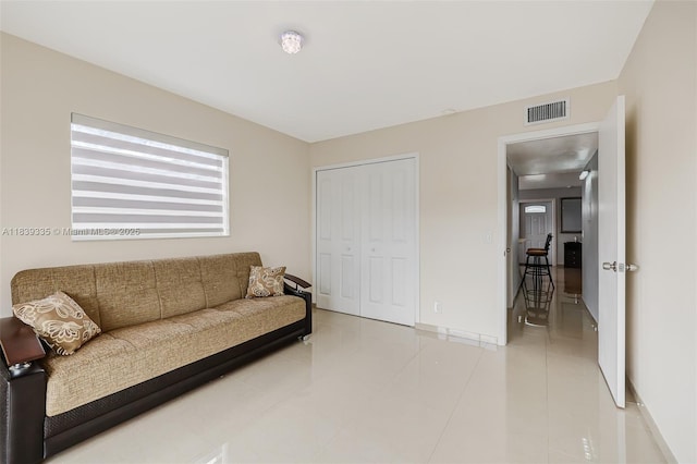 471 Capri J Unit 471, Delray Beach, FL 33484 - living area featuring light tile patterned flooring and baseboards