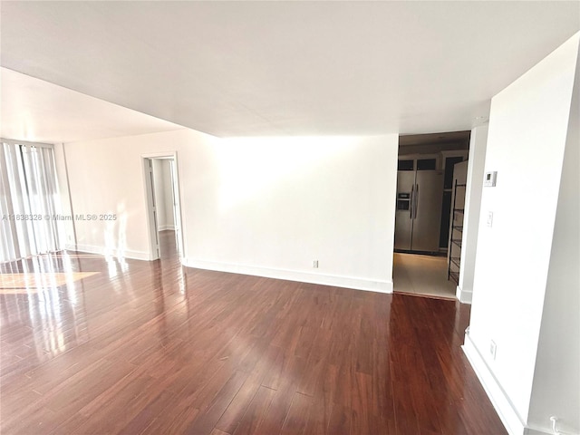 20335 W Country Club Dr Unit 502, Aventura, FL 33180 - spare room with wood finished floors and baseboards