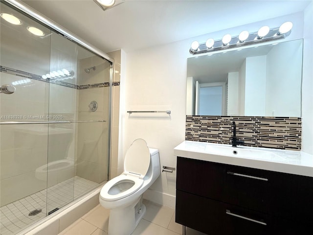 20335 W Country Club Dr Unit 502, Aventura, FL 33180 - bathroom with tile patterned floors, vanity, a shower stall, and backsplash