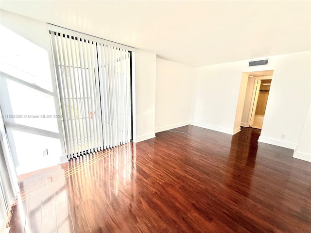 20335 W Country Club Dr Unit 502, Aventura, FL 33180 - spare room with wood finished floors and baseboards