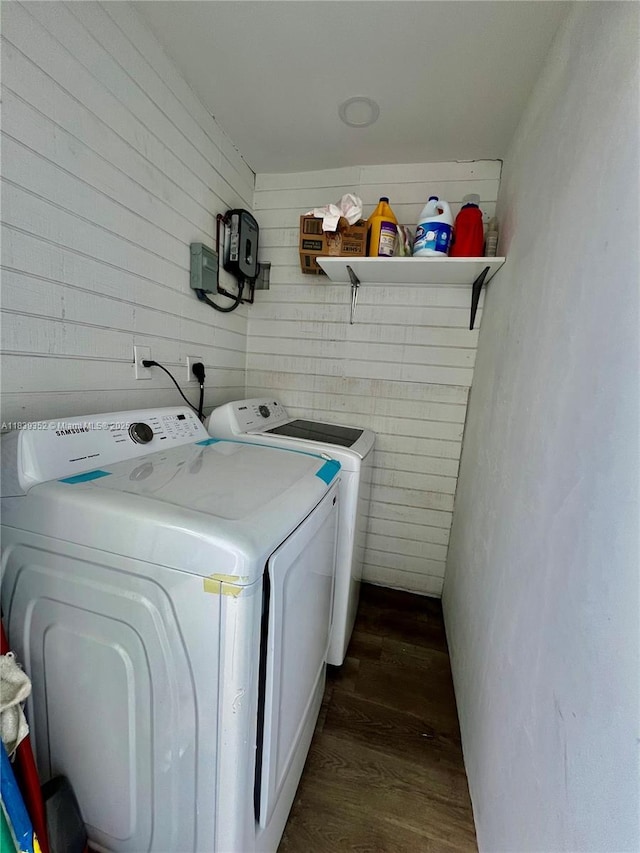 6120 SW 15th Ct, North Lauderdale, FL 33068 - washroom featuring washer and dryer, dark wood-type flooring, and wooden walls
