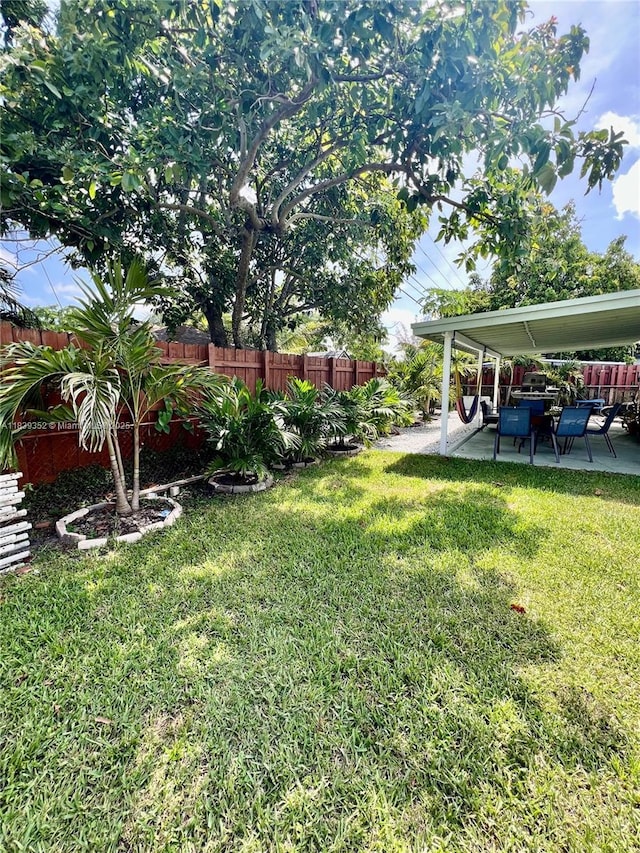 6120 SW 15th Ct, North Lauderdale, FL 33068 - view of yard with a patio