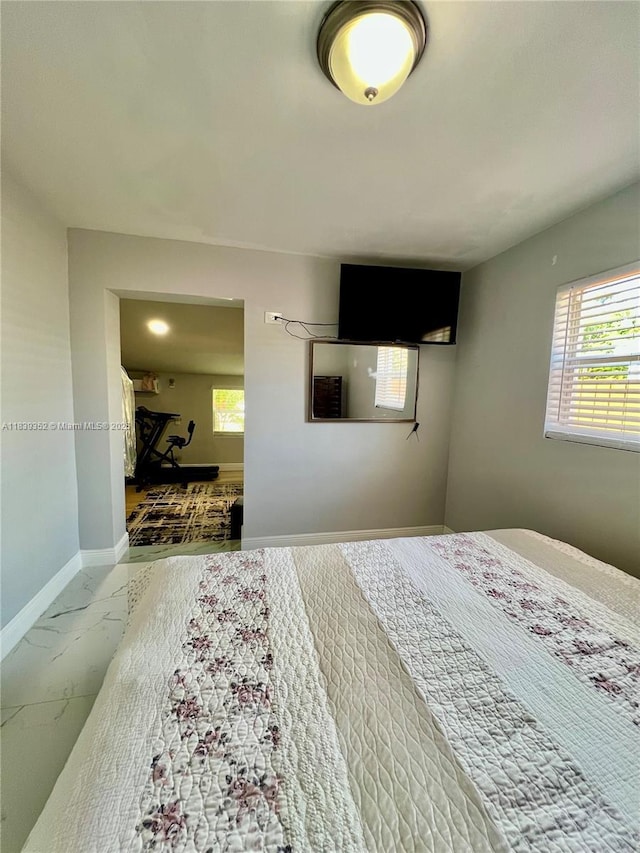 6120 SW 15th Ct, North Lauderdale, FL 33068 - bedroom featuring marble look tile flooring and baseboards