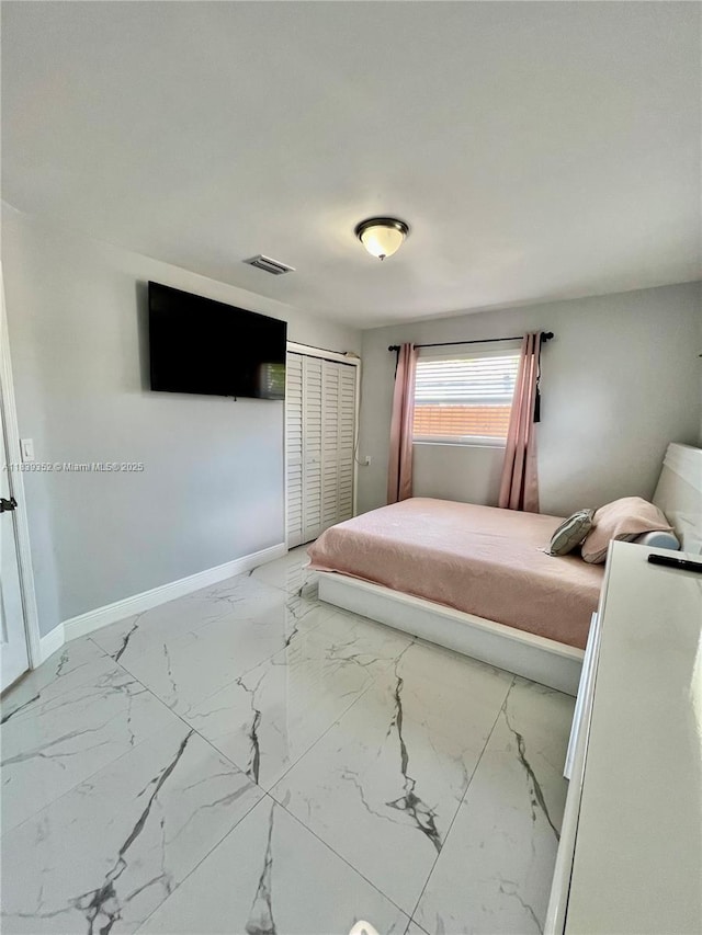 6120 SW 15th Ct, North Lauderdale, FL 33068 - bedroom with marble finish floors and a closet