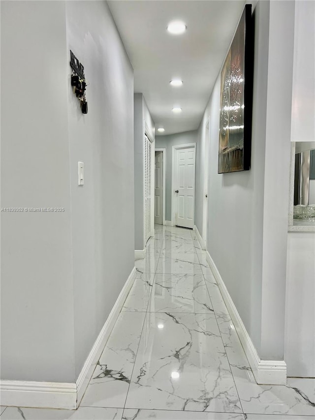 6120 SW 15th Ct, North Lauderdale, FL 33068 - hallway featuring light marble finish floors and recessed lighting