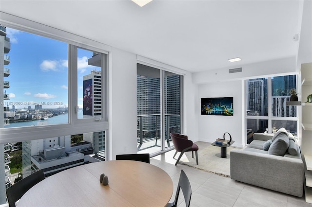 227 NE 2nd St Unit 2000, Miami, FL 33132 - tiled dining space featuring a view of city, plenty of natural light, and expansive windows