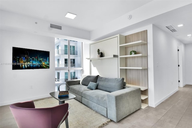 227 NE 2nd St Unit 2000, Miami, FL 33132 - living room featuring light tile patterned flooring and recessed lighting