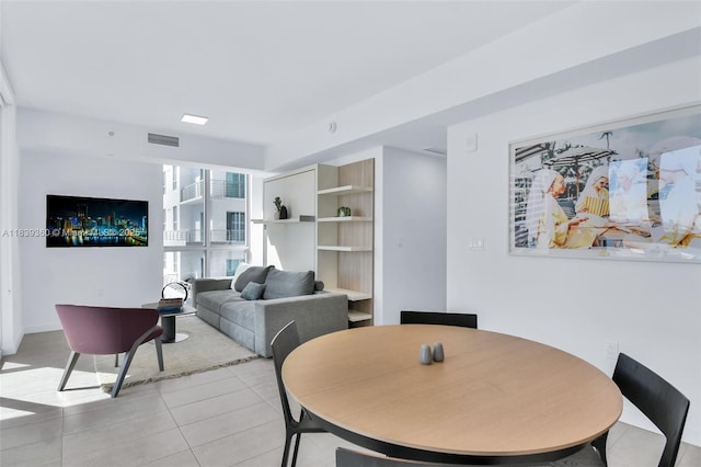 227 NE 2nd St Unit 2000, Miami, FL 33132 - dining area featuring light tile patterned flooring