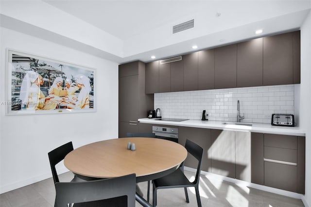 227 NE 2nd St Unit 2000, Miami, FL 33132 - dining room with baseboards and recessed lighting