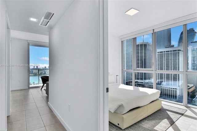 227 NE 2nd St Unit 2000, Miami, FL 33132 - hallway featuring tile patterned flooring