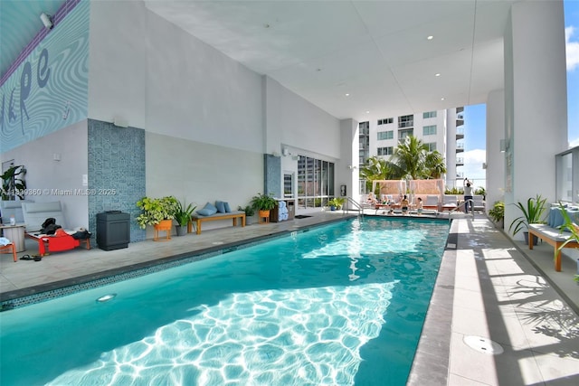 227 NE 2nd St Unit 2000, Miami, FL 33132 - indoor pool featuring a patio