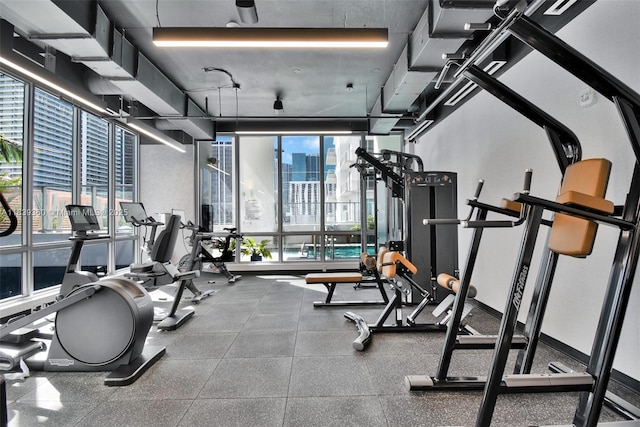 227 NE 2nd St Unit 2000, Miami, FL 33132 - exercise room featuring expansive windows and a view of city
