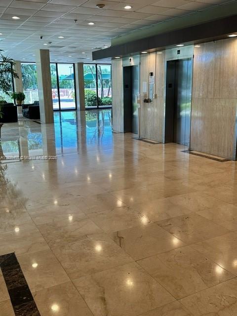 400 S Kings Point Dr Unit 806, Sunny Isles Beach, FL 33160 - lobby featuring a paneled ceiling