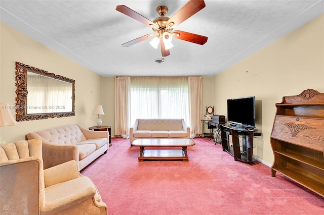 85 NW 21st St, Homestead, FL 33030 - carpeted living area with ceiling fan and baseboards