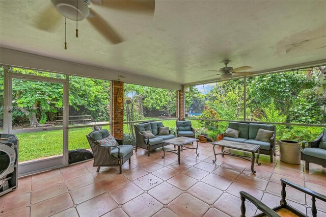 85 NW 21st St, Homestead, FL 33030 - sunroom with ceiling fan, an outdoor living space, and healthy amount of natural light