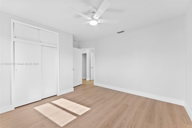 7021 SW 12th St, Pembroke Pines, FL 33023 - unfurnished bedroom with light wood finished floors, a closet, and a ceiling fan
