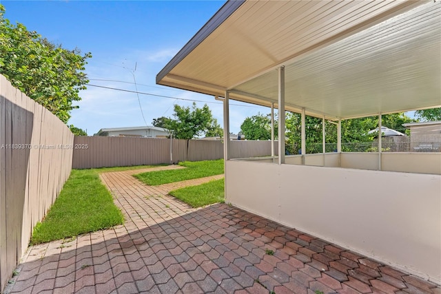 7021 SW 12th St, Pembroke Pines, FL 33023 - fenced backyard with a patio area