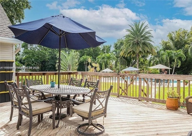 13500 SW 55th St, Southwest Ranches, FL 33330 - wooden deck with outdoor dining space