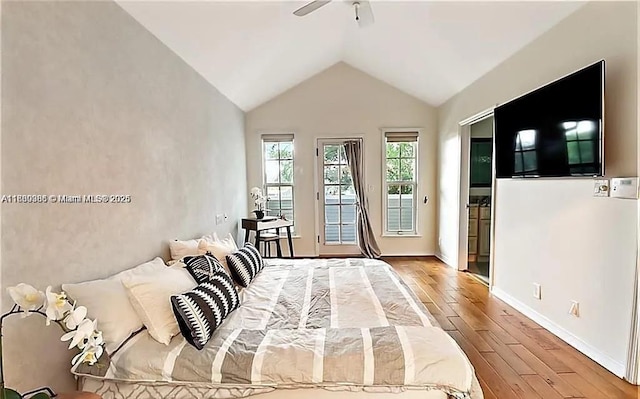 13500 SW 55th St, Southwest Ranches, FL 33330 - bedroom featuring wood finished floors, access to exterior, lofted ceiling, and ceiling fan