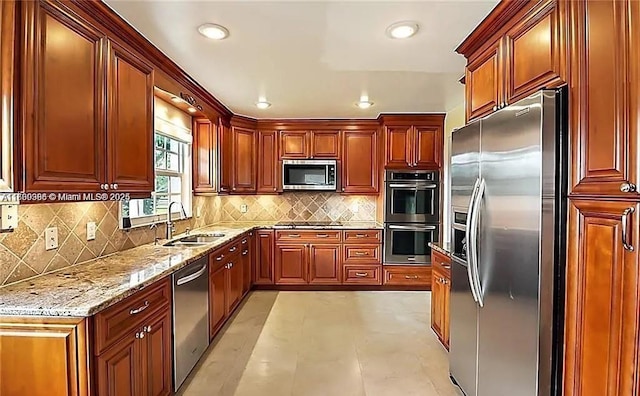 13500 SW 55th St, Southwest Ranches, FL 33330 - kitchen featuring stainless steel appliances, light stone countertops, recessed lighting, and tasteful backsplash