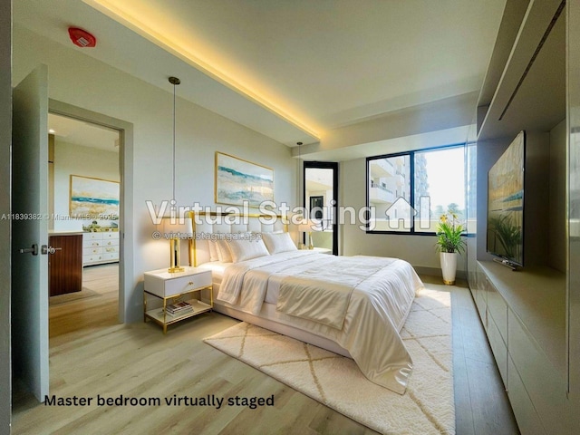 201 Crandon Blvd Unit 305, Key Biscayne, FL 33149 - bedroom with light wood-style flooring