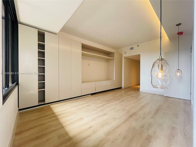 201 Crandon Blvd Unit 305, Key Biscayne, FL 33149 - unfurnished bedroom with light wood-style flooring and baseboards