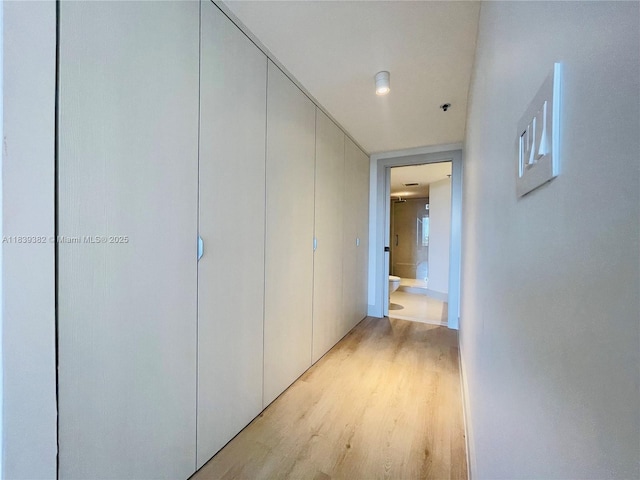 201 Crandon Blvd Unit 305, Key Biscayne, FL 33149 - corridor with light wood finished floors