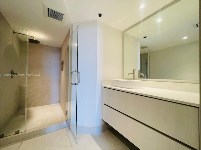 201 Crandon Blvd Unit 305, Key Biscayne, FL 33149 - bathroom featuring a stall shower, vanity, tile patterned floors, and recessed lighting