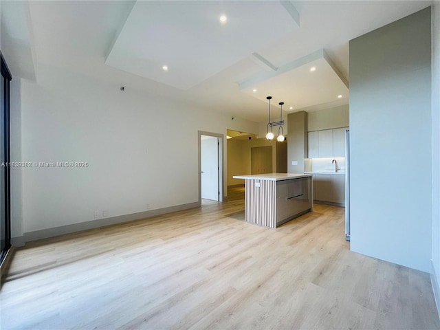 201 Crandon Blvd Unit 305, Key Biscayne, FL 33149 - kitchen with a center island, modern cabinets, light wood finished floors, light countertops, and recessed lighting