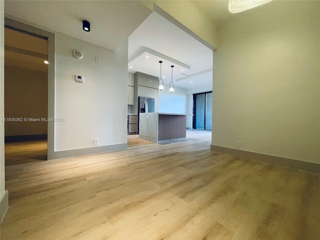 201 Crandon Blvd Unit 305, Key Biscayne, FL 33149 - unfurnished living room with light wood-style floors and recessed lighting